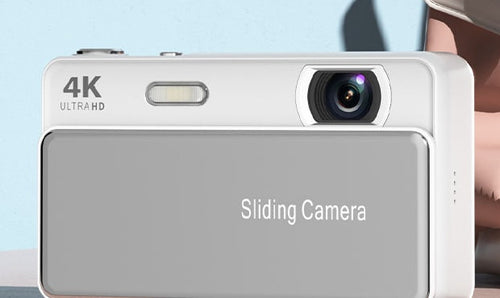 The M15 Sliding Camera in silver, lens exposed, seen from the front